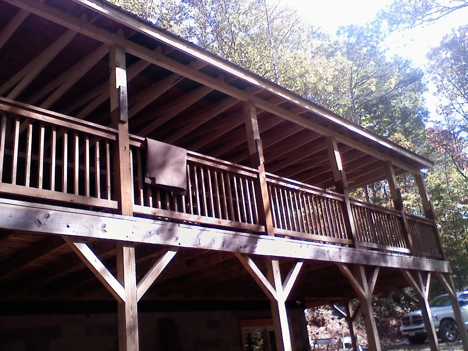 Timber framing under a new elevated porch and deck — Roof Leak Repair in Onalaska by Roofing Brothers